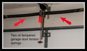 two oil soaked garage door torsion springs