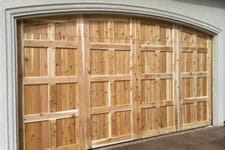 natural wood arched garage door