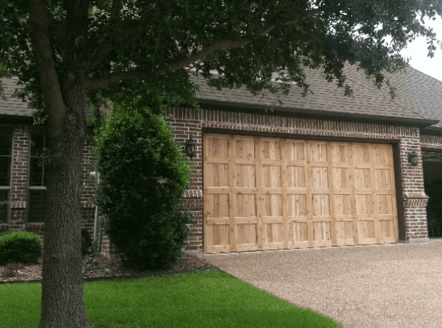 Schatzline after custom cedar wood garage door